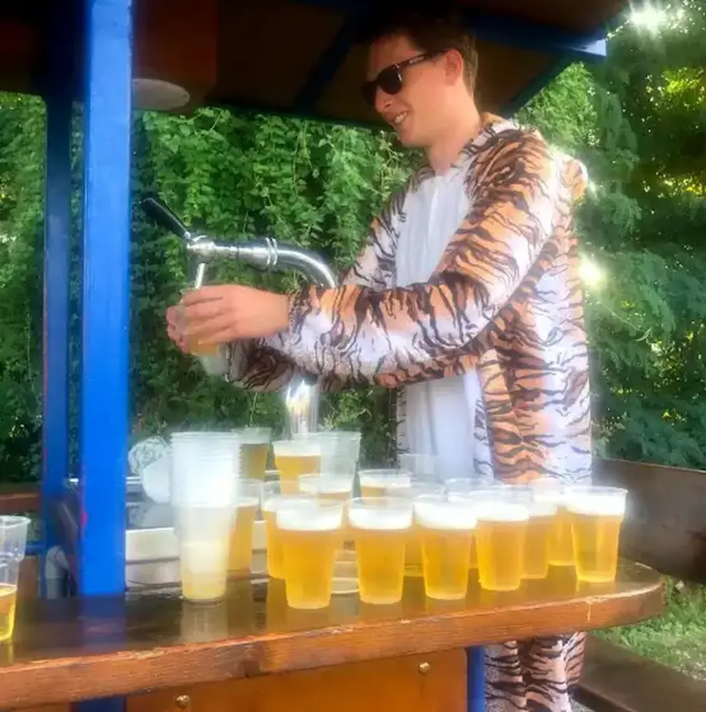 Cold beer being poured on tap on the beer bike
