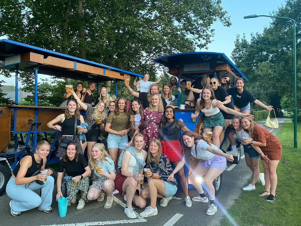 Large group with beer bike in the park